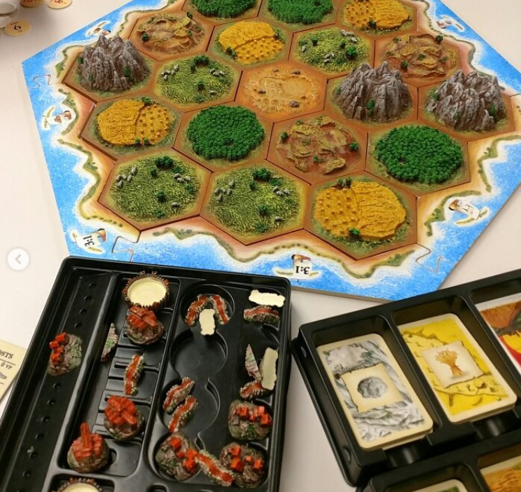 Settlers of Catan board game and pieces