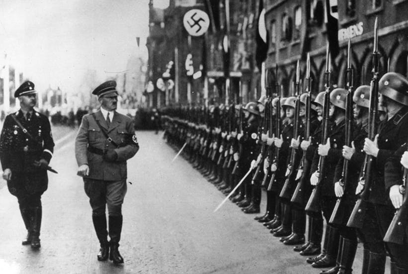 Hitler reviewing Nazi troops