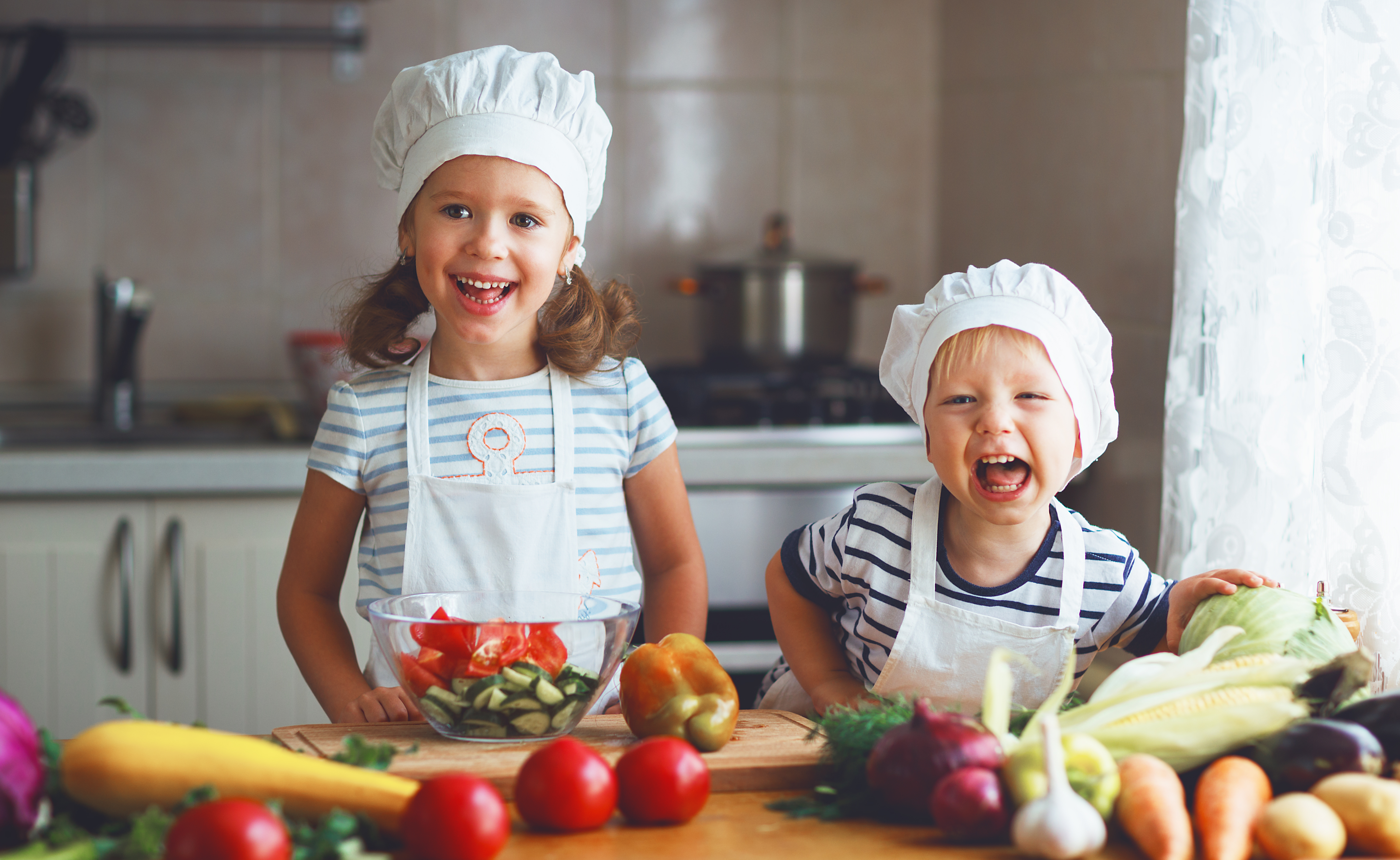 Children cooking with healthy foods