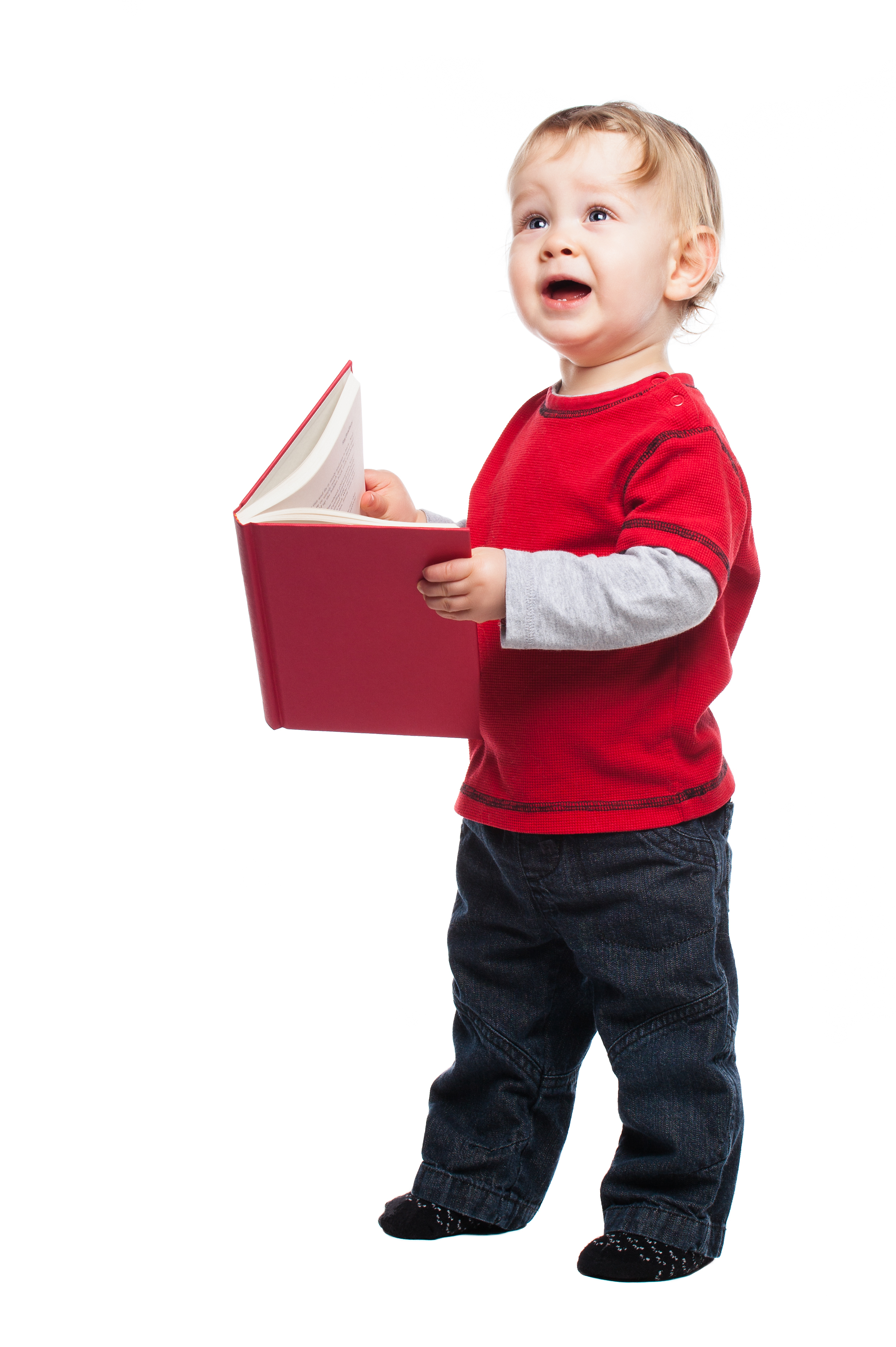 baby standing with book