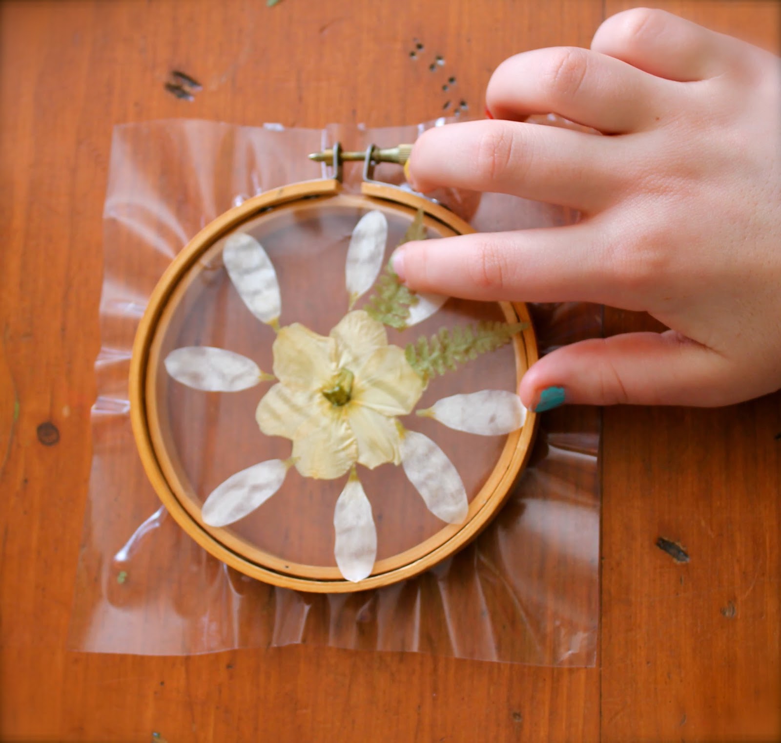 embroidery hoop pressed petal suncatcher