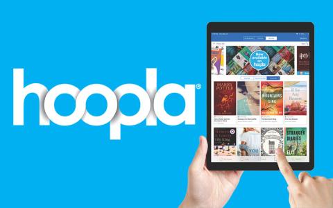 Hoopla logo featuring a tablet with book covers 