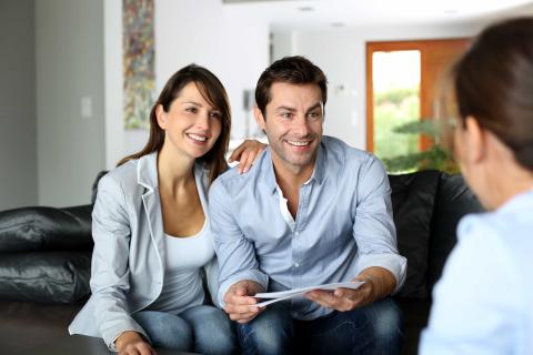 Couple talking to an attorney