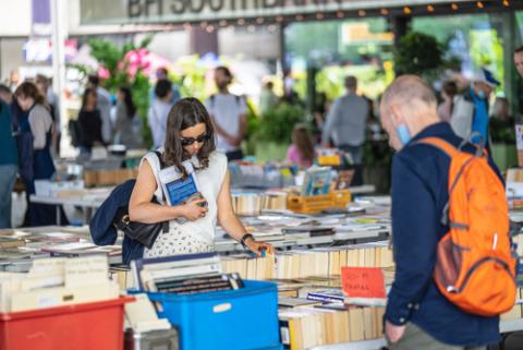 people browsing a book sale