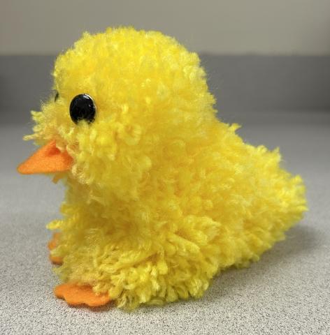 Yellow duck made out of yarn