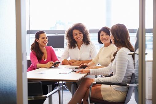 women around a table