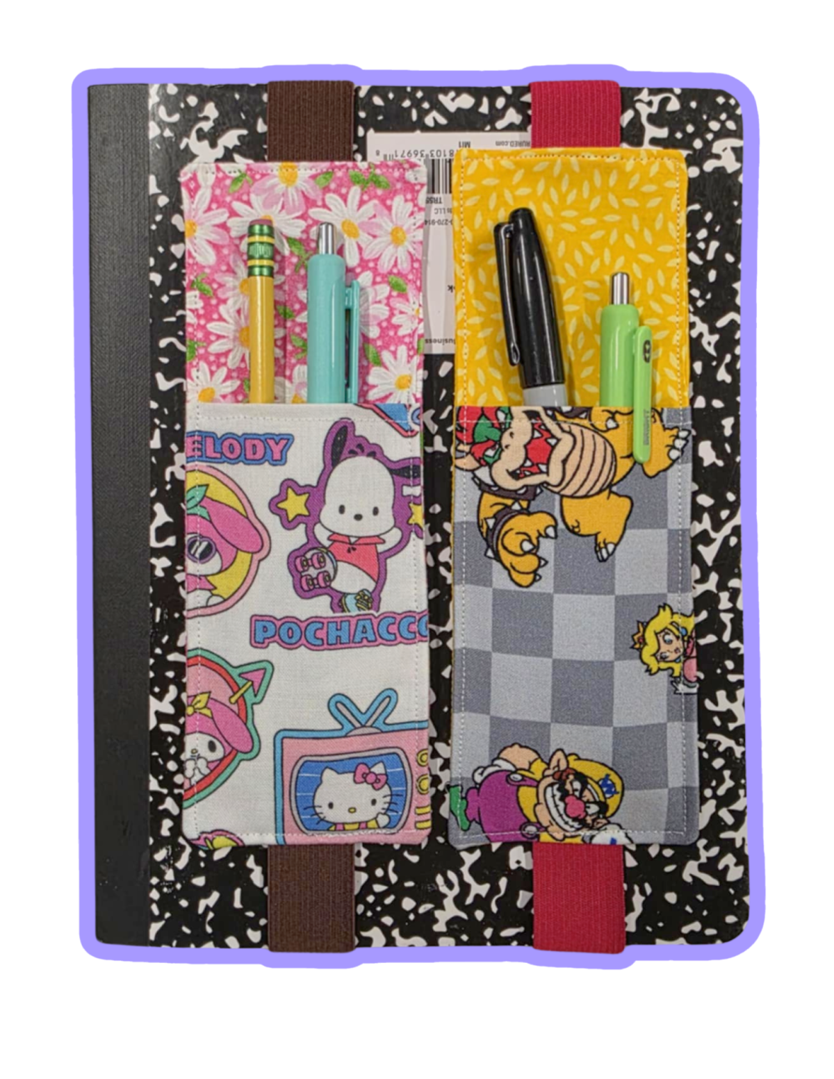 Sewn pockets holding pens on a composition notebook. 