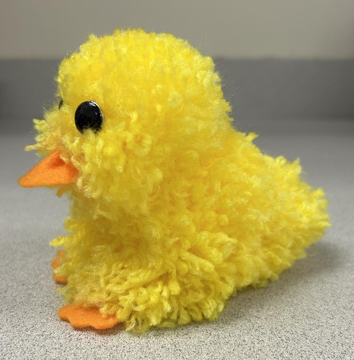 Yellow duck made out of yarn