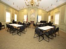 image of memorial room showing tables angled in chevron pattern, seating at each table